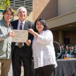 Jay Thompson Photo
Carl Hillman and Mayumi Ogawa hold the posthumous degree awarded to their son, Sean Ogawa Hillman, during Cal Polys June 14 commencement ceremony.