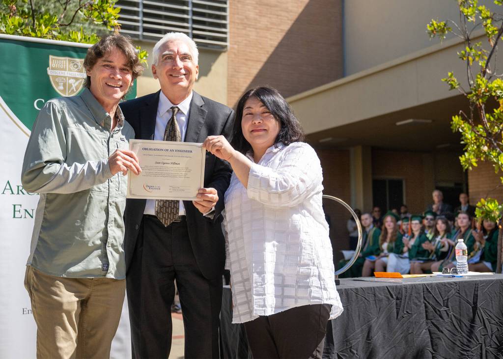 Jay Thompson Photo
Carl Hillman and Mayumi Ogawa hold the posthumous degree awarded to their son, Sean Ogawa Hillman, during Cal Polys June 14 commencement ceremony.