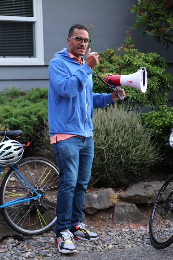 Seattle City Councilmember Rob Saka speaks at the memorial site for Maridee Bonadea during Friday nights Critical Mass ride.