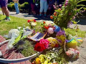Aspen Anderson Photo
Flowers and notes were left near the site where Maridee Bonadea, a longtime Vashon cyclist, was fatally struck near the Fauntleroy ferry dock.