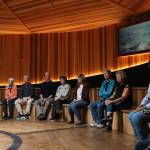 Scarlet Hansen Photo
Tour-goers sit on benches in the ceremonial space.