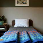 Scarlet Hansen Photo
Resident bedrooms feature soft lighting, plants and wood accents.
