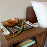 Scarlet Hansen Photo
Braided sweetgrass on top of a side table in one of the bedrooms at the Thunderbird Treatment Center.