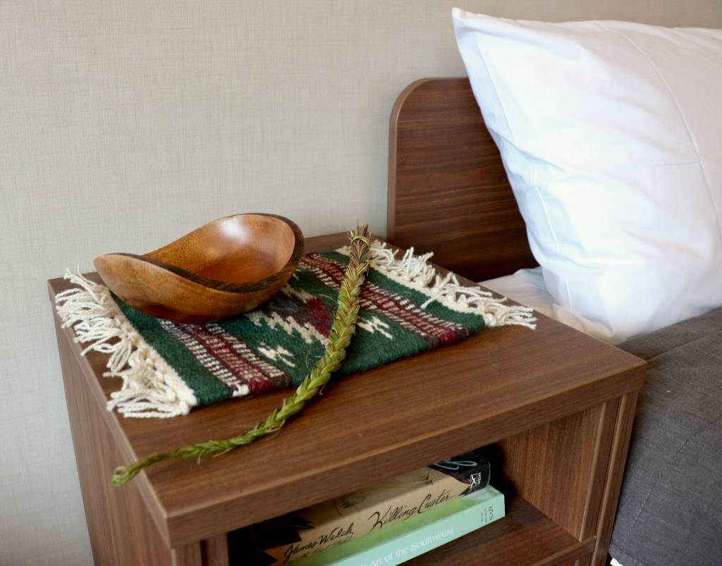 Scarlet Hansen Photo
Braided sweetgrass on top of a side table in one of the bedrooms at the Thunderbird Treatment Center.
