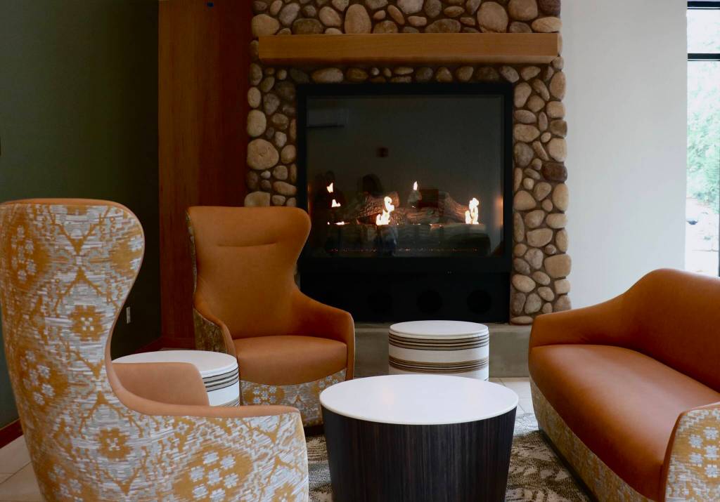 Scarlet Hansen Photo
Couches and chairs surround a fireplace in the main enterance of the treatment center.