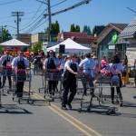 Kent Phelan Photo
Members of the Thriftway Shopping Cart Drill Team perform in the 2017 Strawberry Festival parade.