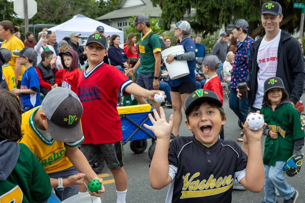 Alex Bruell Photo
Islanders celebrate Vashon during the 2025 Strawberry Festival parade.
