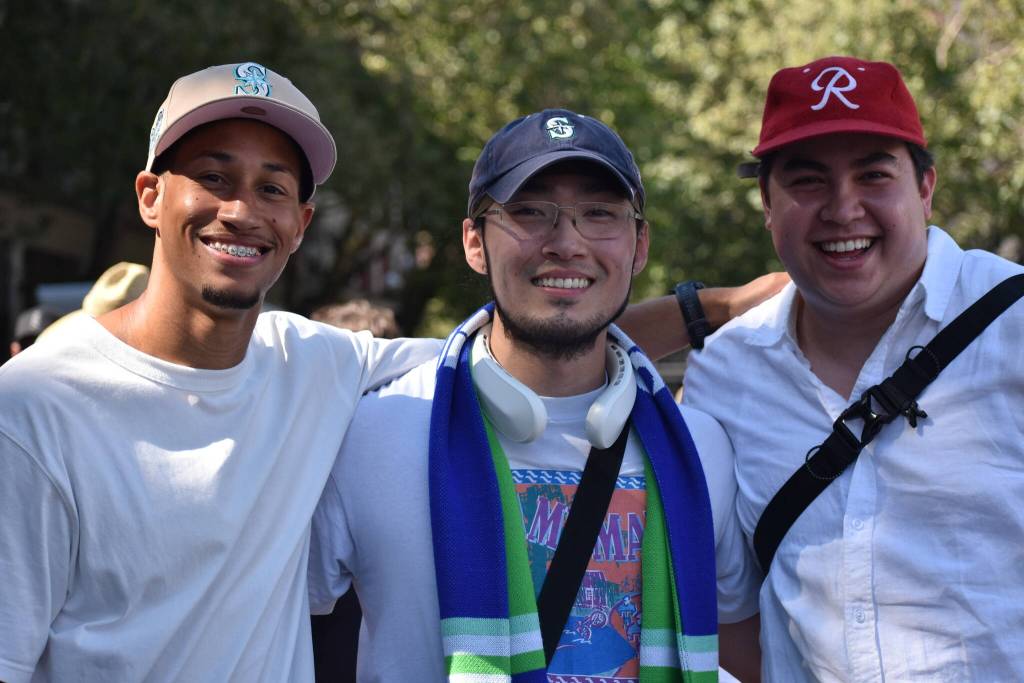 Kemuel Santana (left), Elion Chong (middle) and Tyler Lum (right) get ready to watch the US National Team play. Ben Ray / The Reporter