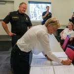 Terry Donnelly Photos
Vashon Island Fire Rescue Deputy Chief Ben Davidson, VIFR Board Chair Brigitte Shran-Brown and Vashon Health Care District Superintendent Tim Johnson sign a three-year funding agreement for Mobile Integrated Health on June 9.
