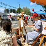 Scarlet Hansen Photo
Island artist Michelle Lassaline illustrates a You as an Animal portrait on Saturday.
