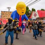 Kent Phelan Photo
Backbone Campaigns inflatable caricature of Donald Trump towers over marchers in the parade.