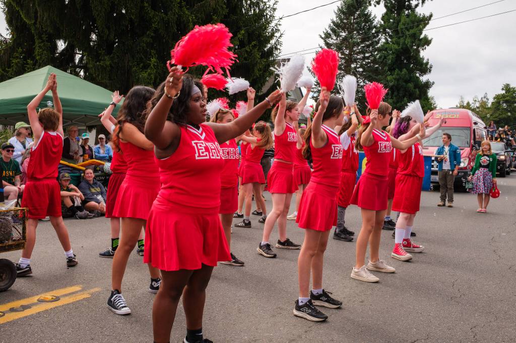 Kent Phelan Photo
Performers in Vashon Center for the Arts production of High School Musical cheer their way through the parade.