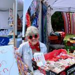 Scarlet Hansen Photo
Islander Jennifer Culp hands out prizes at the Vashon Island Unitarian Universalists booth.