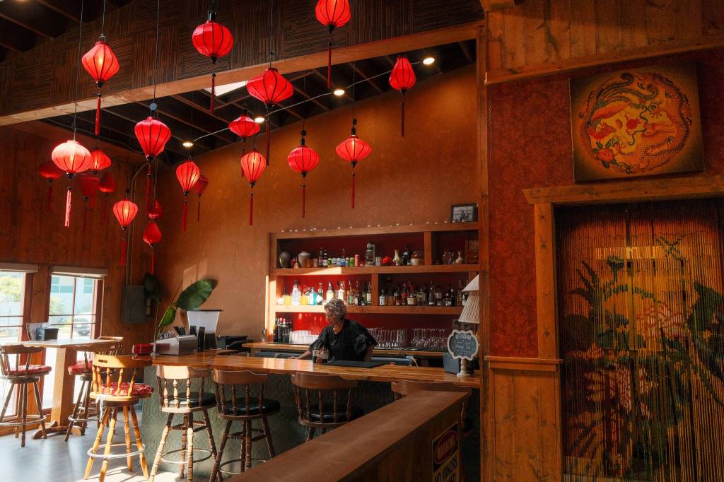 Red lanterns illuminate the Asian saloon-inspired interior of Oh Vashon. (Mariel Torres Photo)