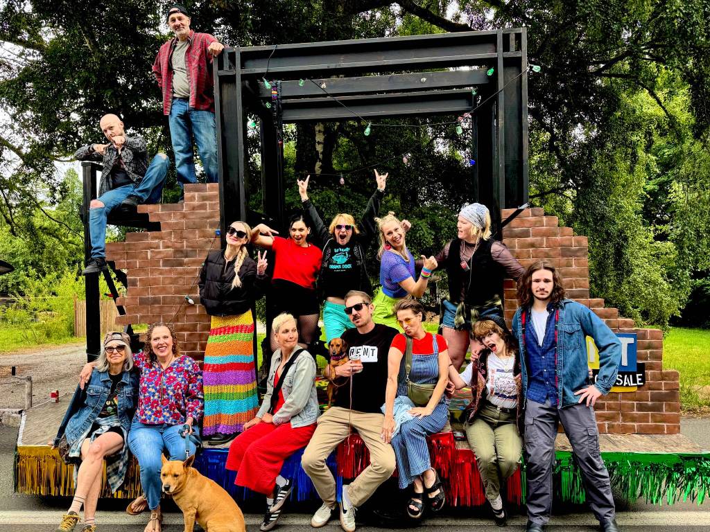 Cast and crew of Rent staging for the Strawberry Festival parade. (Courtesy Photo)